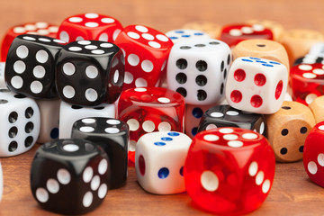 Dice on a wooden table. Concept for business risk.