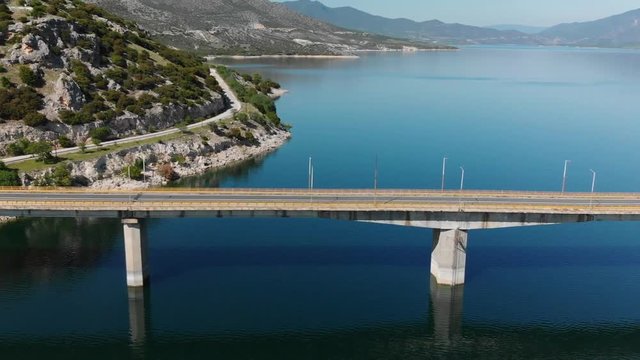 Techniti Limni Polifitou- Bridge over Polifitou Lake in Greece. Aerial- panning