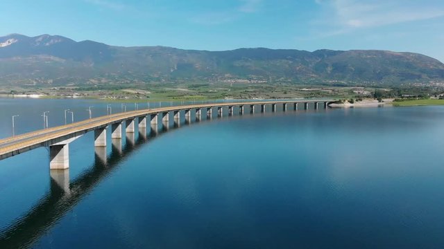 Techniti Limni Polifitou- Bridge over Polifitou Lake in Greece. Aerial- Tilting down.