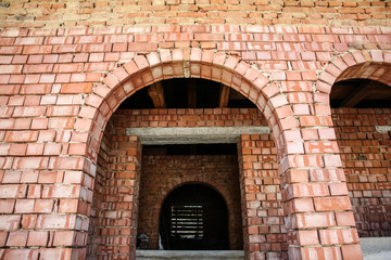 Unfinished house from bricks. Building of new home in process.