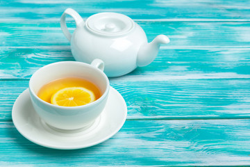 healthy herbal tea over blue background