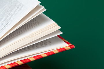 books isolated on green background
