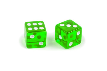 Two green glass dice isolated on white background. Six and three with a shadow.