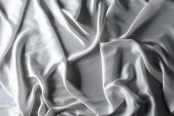 Silk satin fabric texture background.