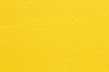 light yellow color concrete wall texture for background and design art work.