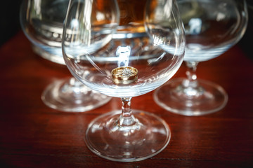 Brandy glass with a wedding ring inside