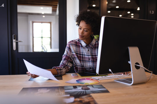 Businesswoman working at desk in office