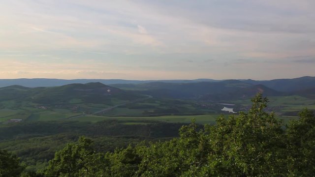 View from Lovos Hill. Sunset  in Central Bohemian Highlands, Czech Republic. Central Bohemian Uplands  is a mountain range located in northern Bohemia. The range is about 80 km long.