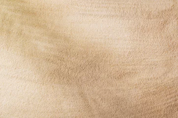 Foto op Plexiglas Zandstrand achtergrond bovenaanzicht met zichtbare zand textuur. Achtergrond voor mockups en reclame. © wstockstudio