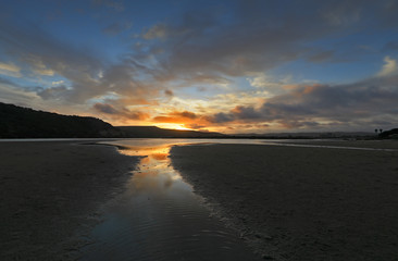 The setting sun at the Kleinbrak River mouth