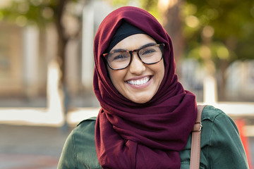 Smiling young woman in hijab