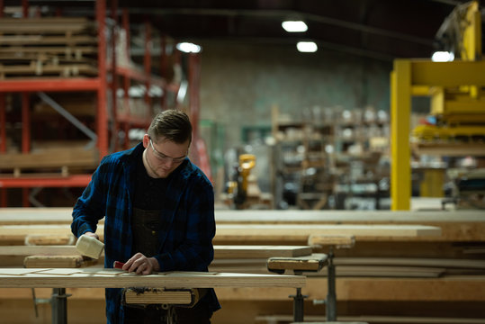 Carpenter working at a workshop