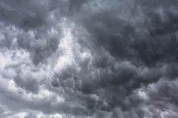 Naklejka na ściany i meble Dark storm clouds pattern before heavy rain
