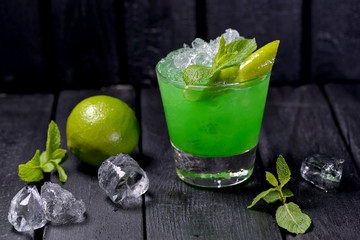 mojito cocktail on a green background