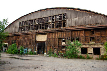 old wooden abandoned aircraft hangar