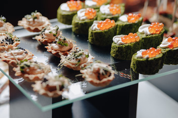 delicious festive buffet with canapes and different delicious meals