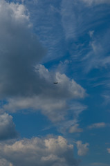 light aircraft against the sky with clouds