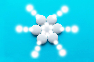  Pills geometric light pattern, bright abstract circles of light on blue background