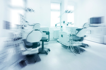 dentist chair in empty dental clinic interior