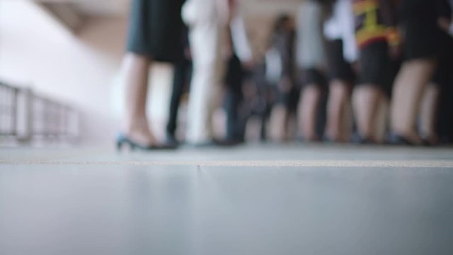 Office employees training by walking in rows