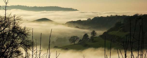 Mist over the hills from Uley Fort, Uley, Gloucestershire, UK