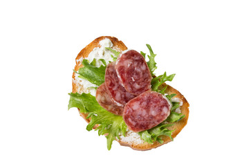 Sandwich with sausage, salad and cheese on a white background.