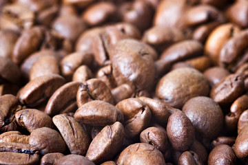 Roasted coffee beans, closeup. Background.