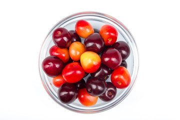 Fresh cherry on plate on Isolated white background. fresh ripe cherries. sweet cherries. Berries