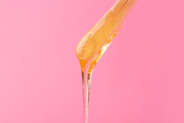 Stick with sugaring paste on color background