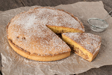Homemade Apple Pie on wooden background. Classic autumn dessert