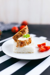 Chicken fillet with rice and tomatoes