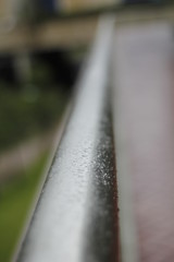Metallic railing in a rainy day