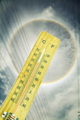 Thermostat The background is a high voltage cable and has a halo.