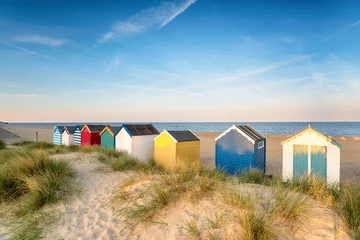 Tuinposter Beach huts in sand dunes at Southwold © Helen Hotson