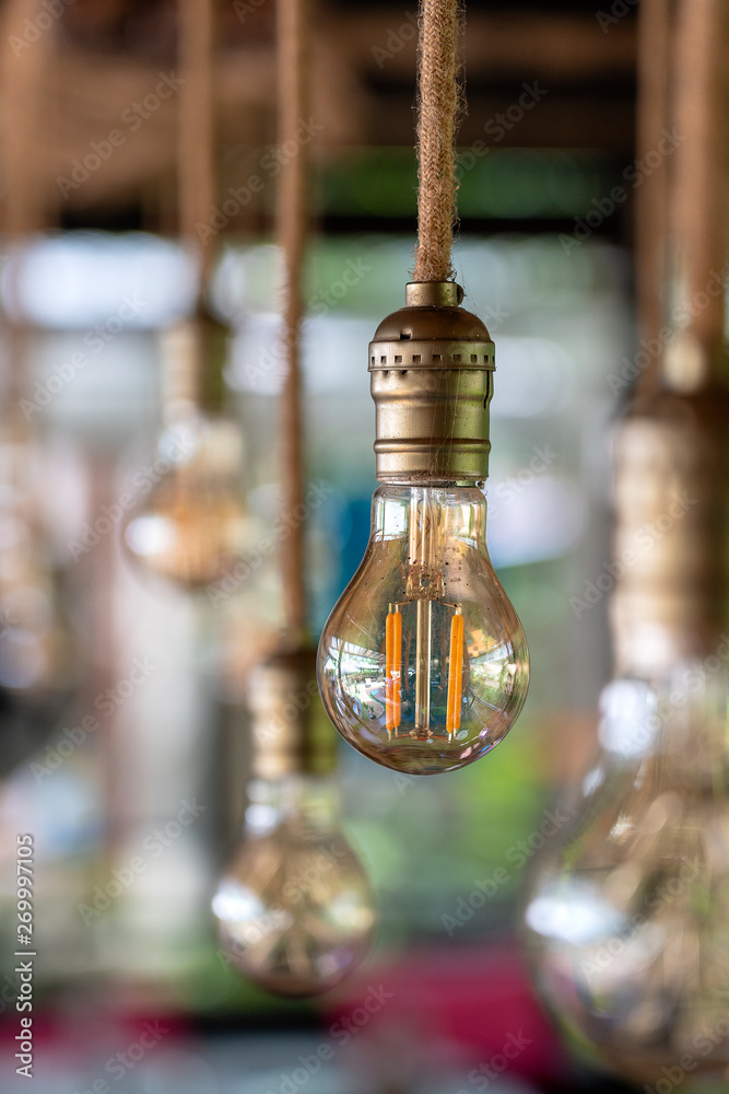 Wall mural decorative antique edison style light bulbs, vintage electric lamp, closeup