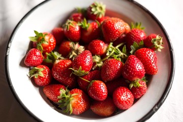 strawberry in metal plate