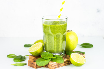 Green smoothie on white.