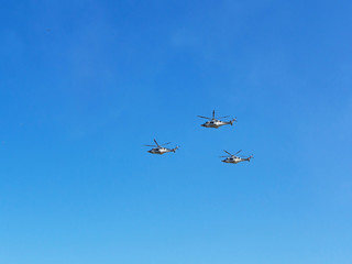 Airshow. Three AW139 in the blue sky