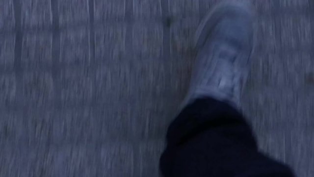 Footage of a persons foot walking backwards