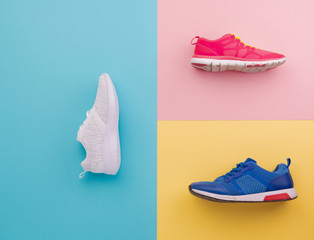 A studio shot of running shoes on bright color background. Flat lay.