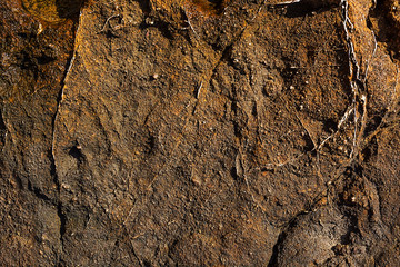 Sea stones texture and background, rock red and brown texture