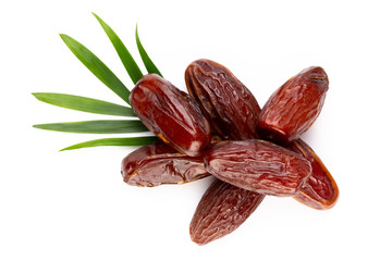 Dry dates isolated on white background. Top view. Flat lay pattern.