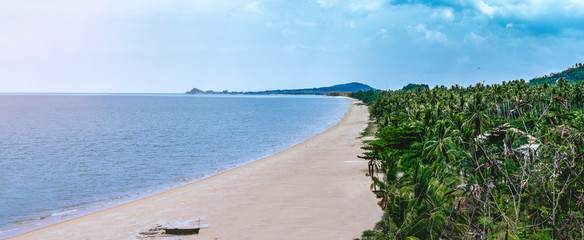 South of thailand sea sun sandy beach near coconut tree and blue sea landscape.