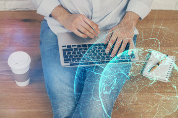 Media network theme hologram with man working on computer on background. Concept of internet communication. Double exposure.