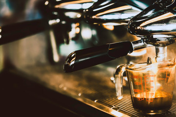 Coffee machine make coffee with in cafe vintage color tone