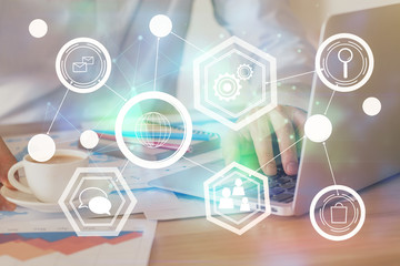 Media network theme hologram with man working on computer on background. Concept of internet communication. Double exposure.