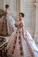 19th century lady in violet crinoline