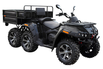 Modern ATV with a trailer for the transport of goods is on the site for inspection.