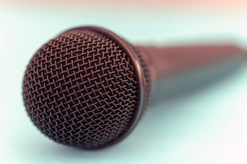 microphone close-up on blue background