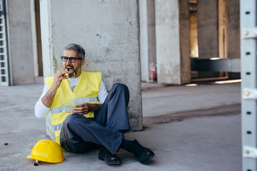 construction worker on lunch break on construction site